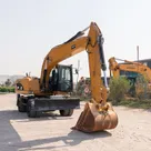 2014 Caterpillar M318D Wheeled Excavator Front Right View