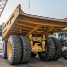 2023 Caterpillar 777 Rigid Dump Truck Rear Left View