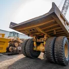 2023 Caterpillar 777 Rigid Dump Truck Rear Right View