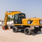 2014 Caterpillar M318D Wheeled Excavator Rear Left View