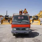 2003 Multitel 160 ALU DS Boom Lift on Nissan Cabstar Truck Front View - LF-0058