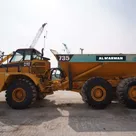 2004 Caterpillar 735 Articulated Dump Truck Left View