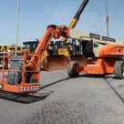 2008 JLG 1250AJP Articulated Boom Lift Front Left View