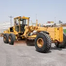 2009 Komatsu GD705A-4AE Motor Grader Front Right View