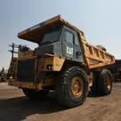2012 cat 773E rigid dump truck front left view