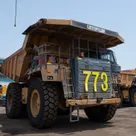 2019 Caterpillar 777E Rigid Dump Truck Front Right Side View