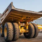 2022 Caterpillar 777 Rigid Dump Truck Rear Left View