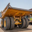 2023 Caterpillar 777 Rigid Dump Truck Rear Left View