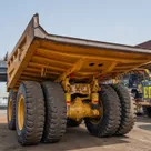 2023 Caterpillar 777 Rigid Dump Truck Rear Left View