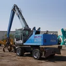 Material Handler 2013 Terex Fuchs MHL 335 rear left view - Al Marwan Heavy Machinery