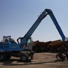 Material Handler 2013 Terex Fuchs MHL 335 right side view - Al Marwan Heavy Machinery