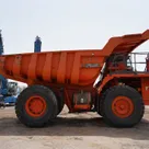 Rigid Dump Truck 2011 Hitachi EH1100-3 - right side view - Al Marwan Heavy Machinery