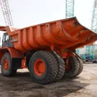 2011 Hitachi EH1100-3 Rigid Dump Truck rear left view - Al Marwan Heavy Machinery