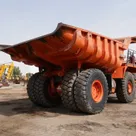 2011 Hitachi EH1100-3 Rigid Dump Truck rear-left- Al Marwan