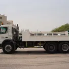 Volvo FM12 Cargo Truck 6x4 - Superior Traction-Spacious Bed-Left-Side-Image