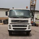 Volvo FM12 Cargo Truck 6x4 - Superior Traction-Spacious Bed-Front-Image