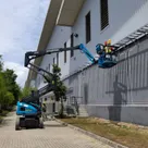 Sinoboom AB16EJ Articulated Boom Lift on Jobsite