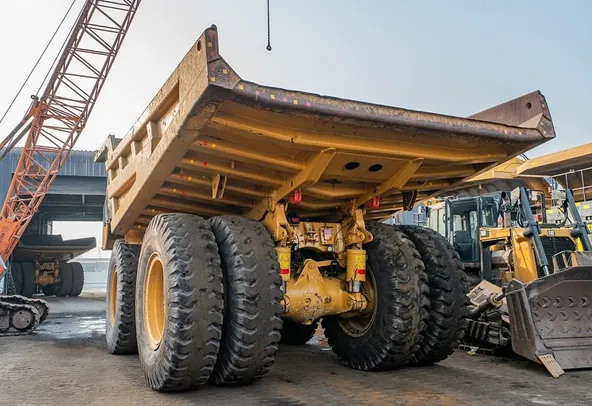 2023 Caterpillar 777 Rigid Dump Truck Rear Left View
