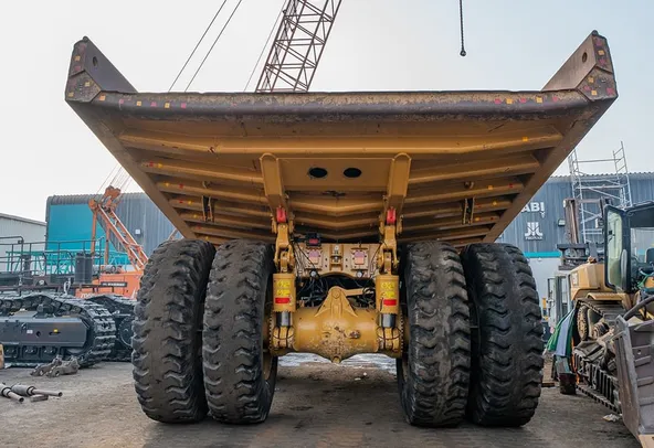 2023 Caterpillar 777 Rigid Dump Truck Rear View