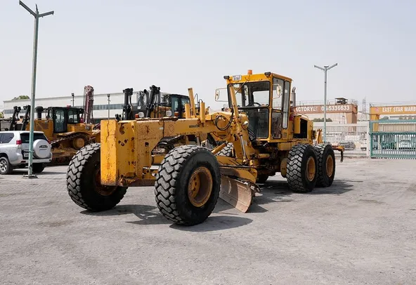 2009 Komatsu GD705A-4AE Motor Grader Front Left View