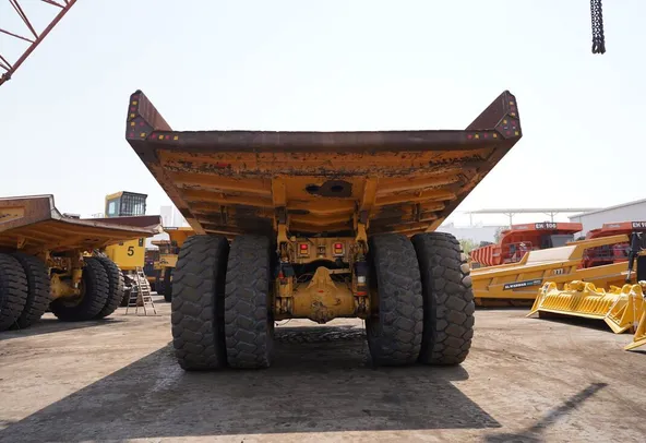 2011 cat 777D rigid dump truck rear view image