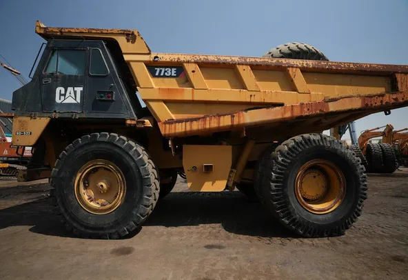 2012 cat 773E rigid dump truck left side view