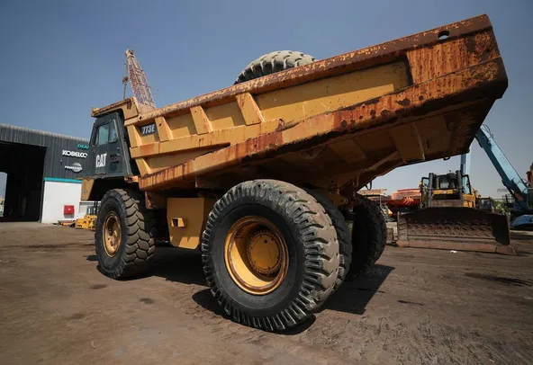 2012 cat 773E rigid dump truck rear left view