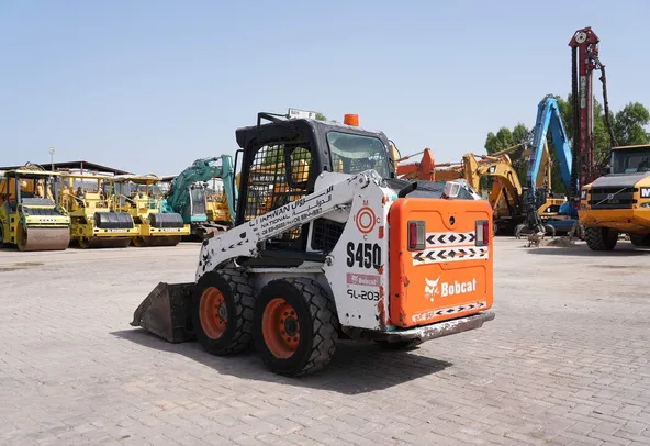 2015 bobcat s450 skid steer loader rear left view