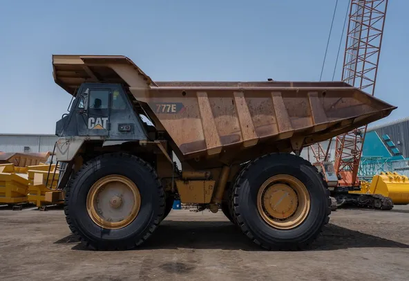 2019 Caterpillar 777E Rigid Dump Truck Left View