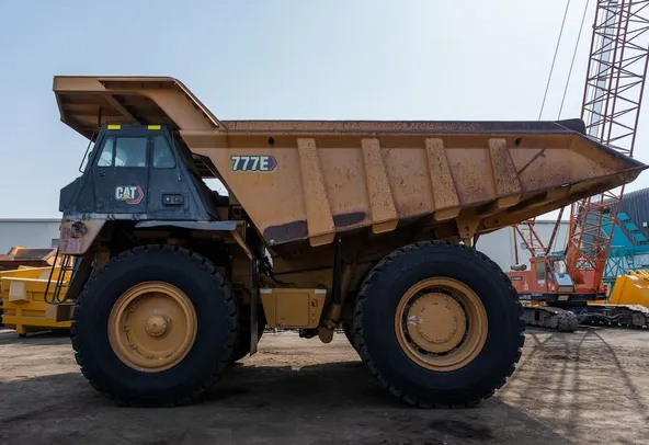 2021 Caterpillar 777E Rigid Dump Truck Left View