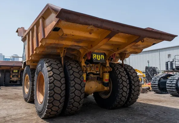 2022 Caterpillar 777E Rigid Dump Truck Rear Left View