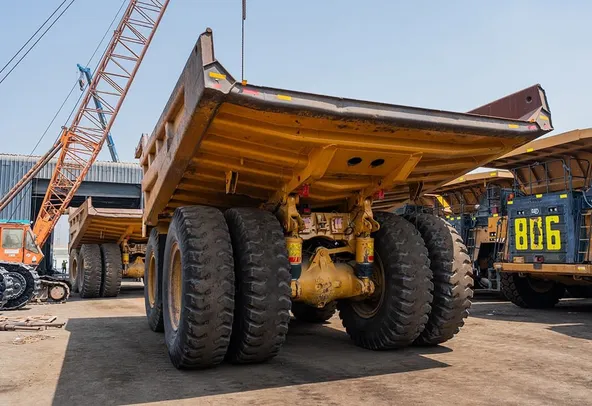 2022 Caterpillar 777E Rigid Dump Truck Rear Left View