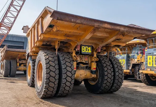 2022 Caterpillar 777E Rigid Dump Truck Rear Left View
