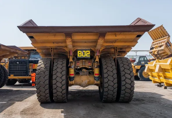 2022 Caterpillar 777E Rigid Dump Truck Rear View