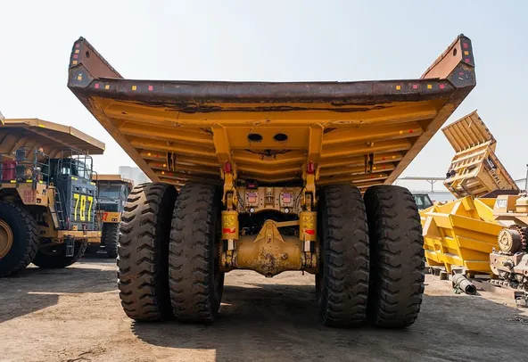 2022 Caterpillar 777E Rigid Dump Truck Rear View