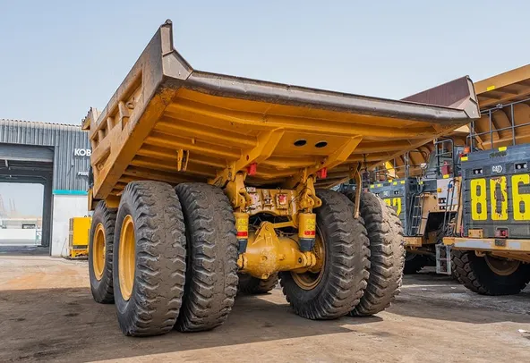 2023 Caterpillar 777 Rigid Dump Truck Rear Left View