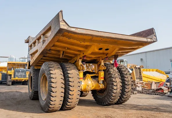 2023 Caterpillar 777 Rigid Dump Truck Rear Left View