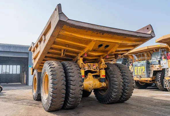 2023 Caterpillar 777 Rigid Dump Truck Rear Left View
