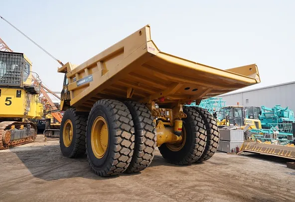 2023 Caterpillar 777 Rigid Dump Truck Rear Left View