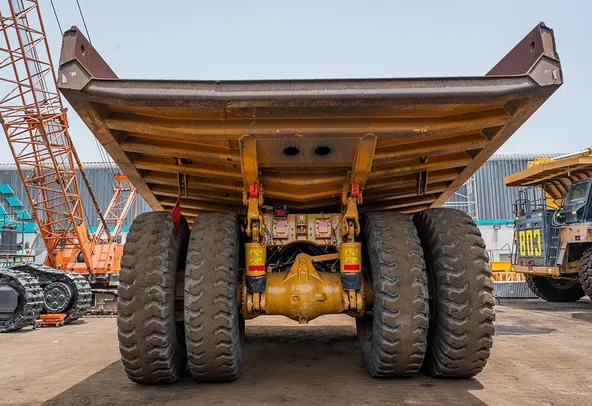 2023 Caterpillar 777 Rigid Dump Truck Rear View