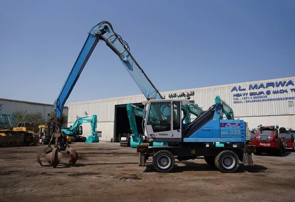 Material Handler 2013 Terex Fuchs MHL 335 left side view - Al Marwan Heavy Machinery