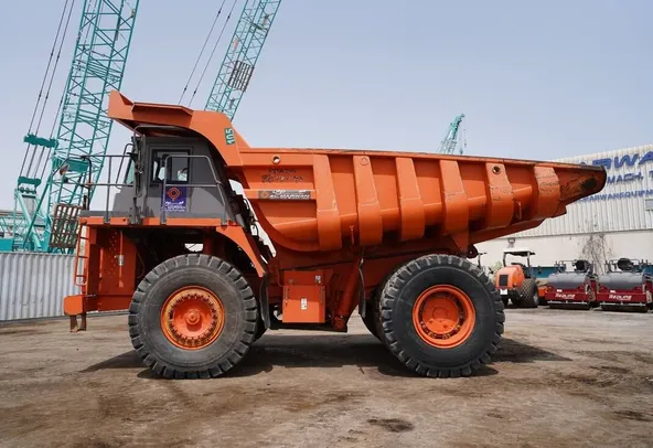 2011 Hitachi EH1100-3 Rigid Dump Truck left side view - Al Marwan Heavy Machinery