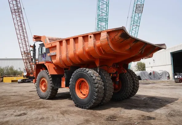 2011 Hitachi EH1100-3 Rigid Dump Truck rear left view - Al Marwan Heavy Machinery