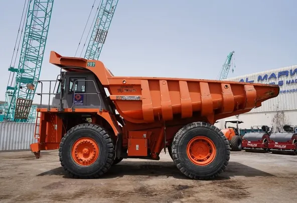 Rigid Dump Truck 2011 Hitachi EH1100-3 - left side view - Al Marwan Heavy Machinery