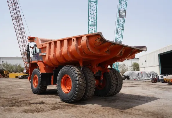 Rigid Dump Truck 2011 Hitachi EH1100-3 - rear left view - Al Marwan Heavy Machinery