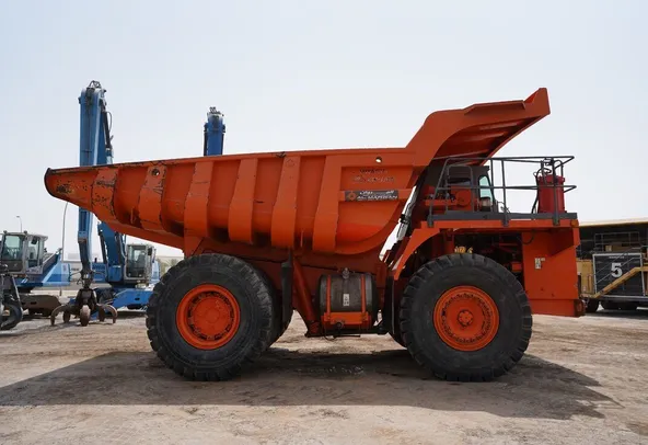 Rigid Dump Truck 2011 Hitachi EH1100-3 - right side view - Al Marwan Heavy Machinery
