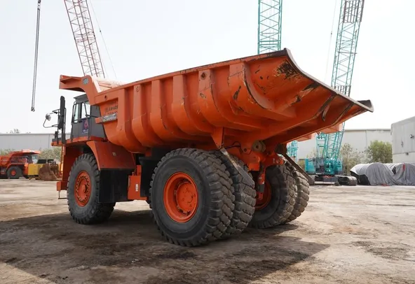 2011 Hitachi EH1100-3 Rigid Dump Truck rear left view - Al Marwan Heavy Machinery