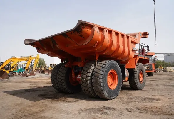 2011 Hitachi EH1100-3 Rigid Dump Truck rear-left- Al Marwan