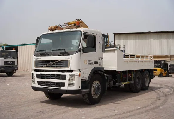 Volvo FM12 Cargo Truck 6x4 - Superior Traction-Spacious Bed-Front-Left-Image