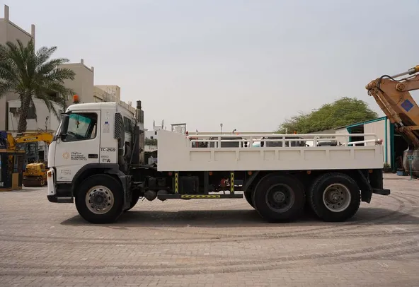 Volvo FM12 Cargo Truck 6x4 - Superior Traction-Spacious Bed-Left-Side-Image